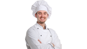 Chef of the Easy Recipes blog smiling while preparing a dish in a bright kitchen.